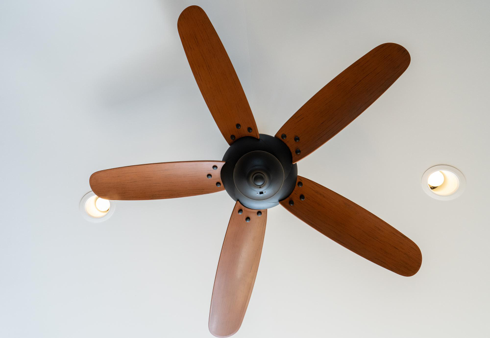 Wood blade design fan installed on a Malaysian home ceiling