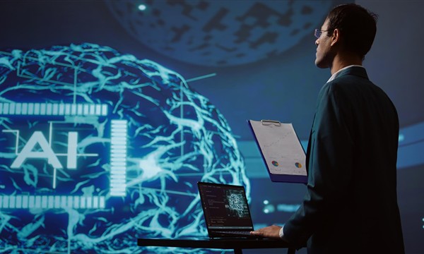 Search specialist reviewing website performance across multiple monitors
