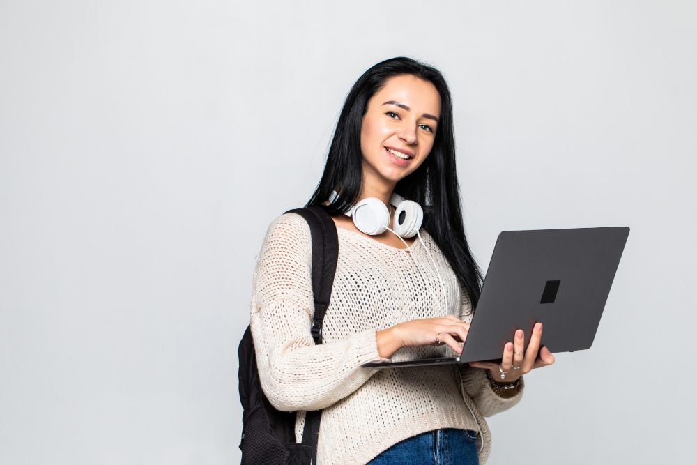 Student holding a laptop for study and everyday learning use